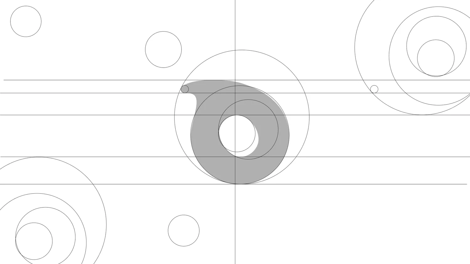 The mark drawn over its construction grid of circles and guides